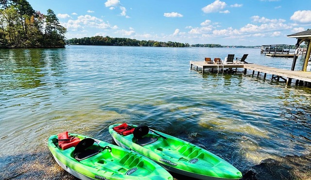 Renovated with great lake views & swim dock!