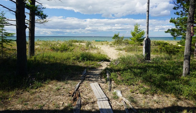 Secluded Beach Front Log Cabin Next to Nature Preserve