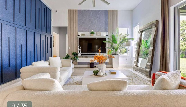 Spacious 4-bedroom house in pleasant Port St. Lucie with AC, WiFi