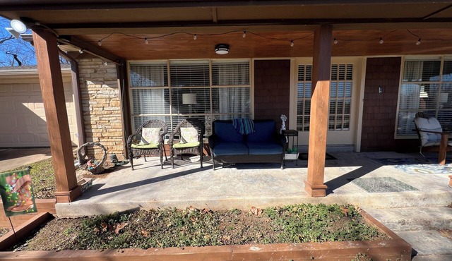 This cozy home has lake access and fishing pier.