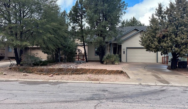 This is a beautiful 3 bedroom, 2 bath cozy, cabin style home.