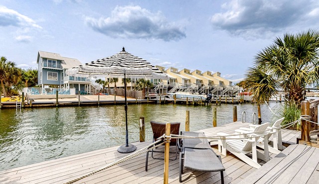 Waterfront home with tennis/boat dock access, deck, grill, & W/D